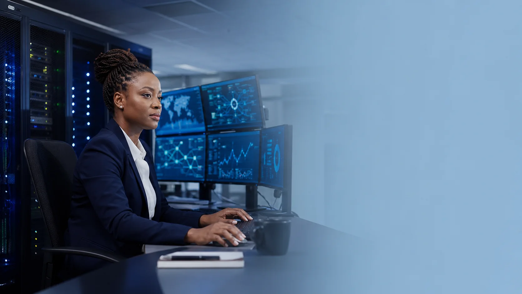 African cybersecurity analyst monitoring enterprise systems