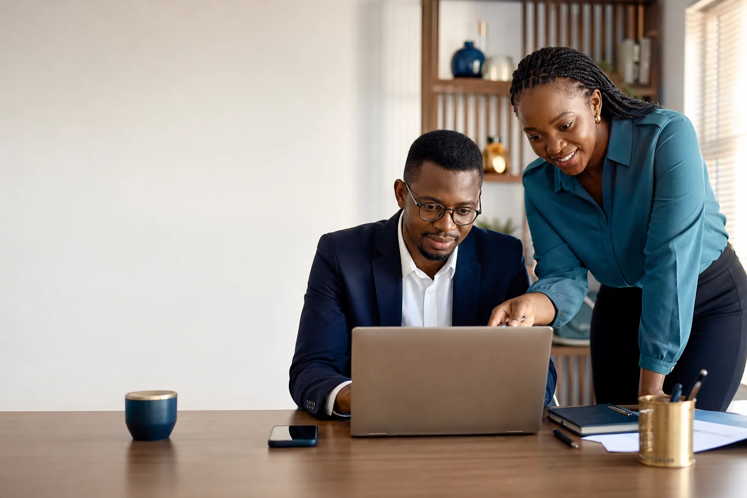 African business professionals discussing technology services